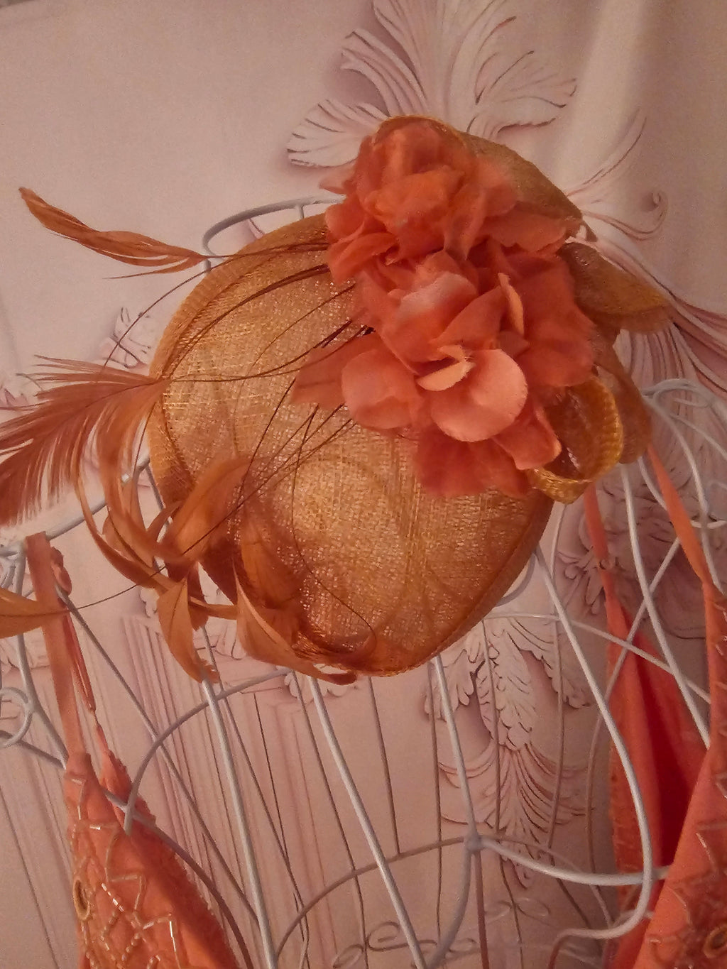 Ladies Coral with feathers Fascinator