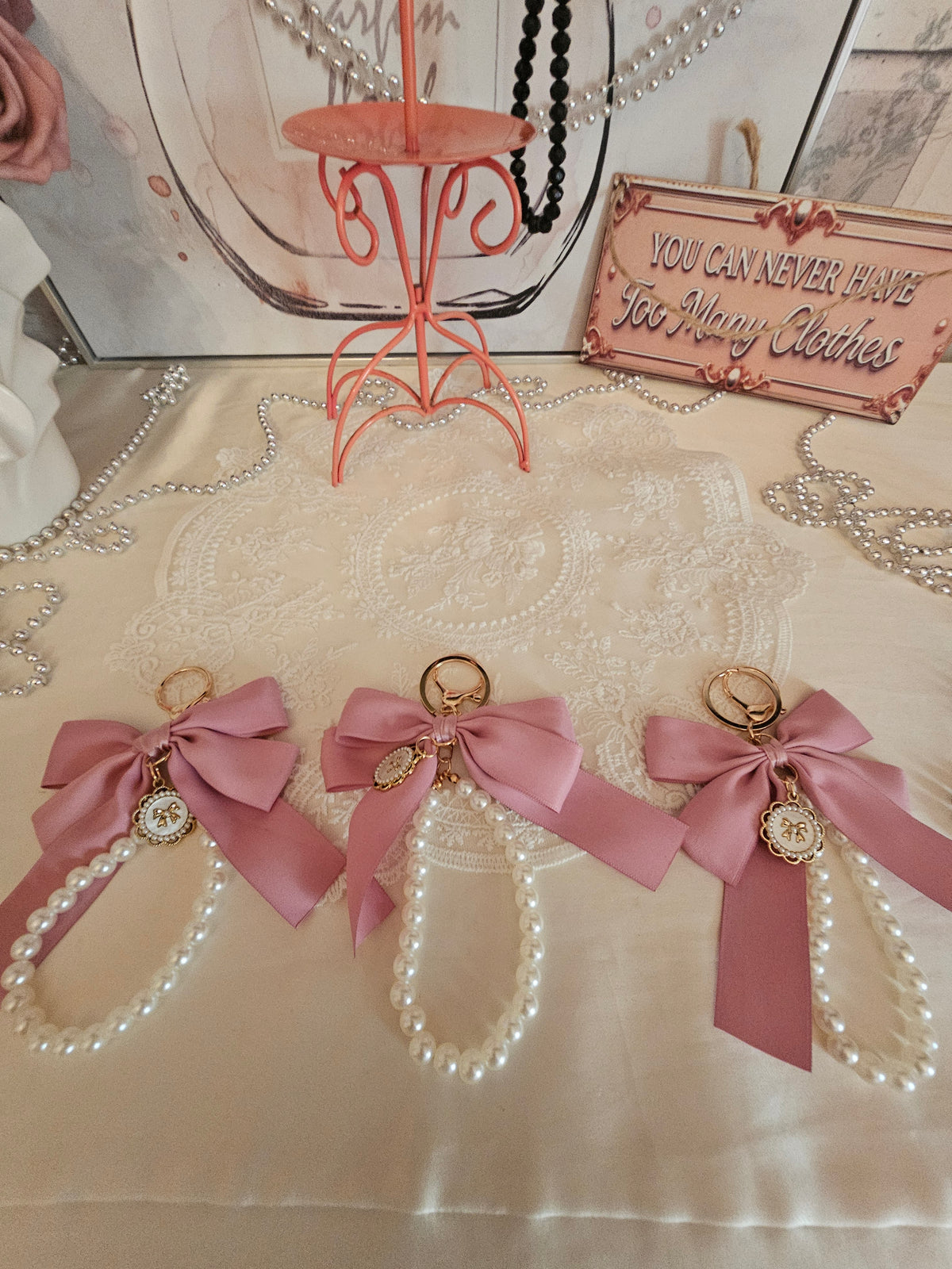 Ladies x 3 classy large pink bow with set of pearls keyrings and gold circle pendant