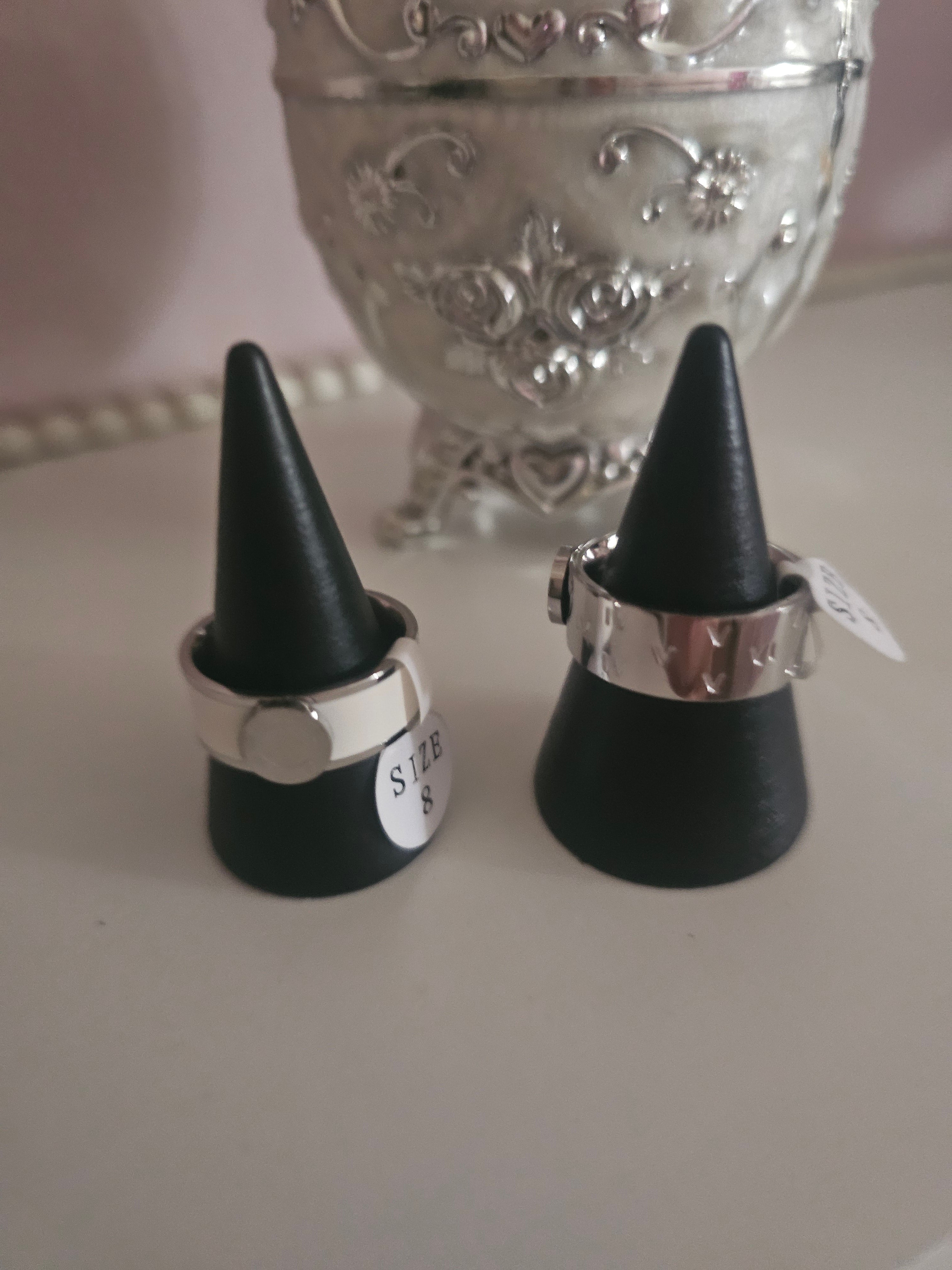 Ladies solid band rings, one white one silver size 8 £10 each