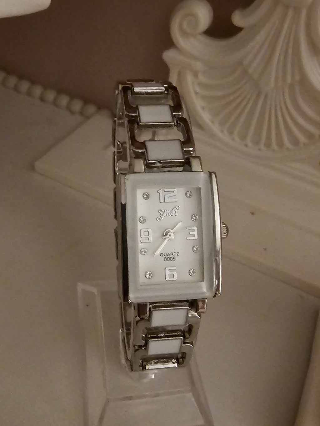 Ladies Silver Square Faced with White detailing Watch