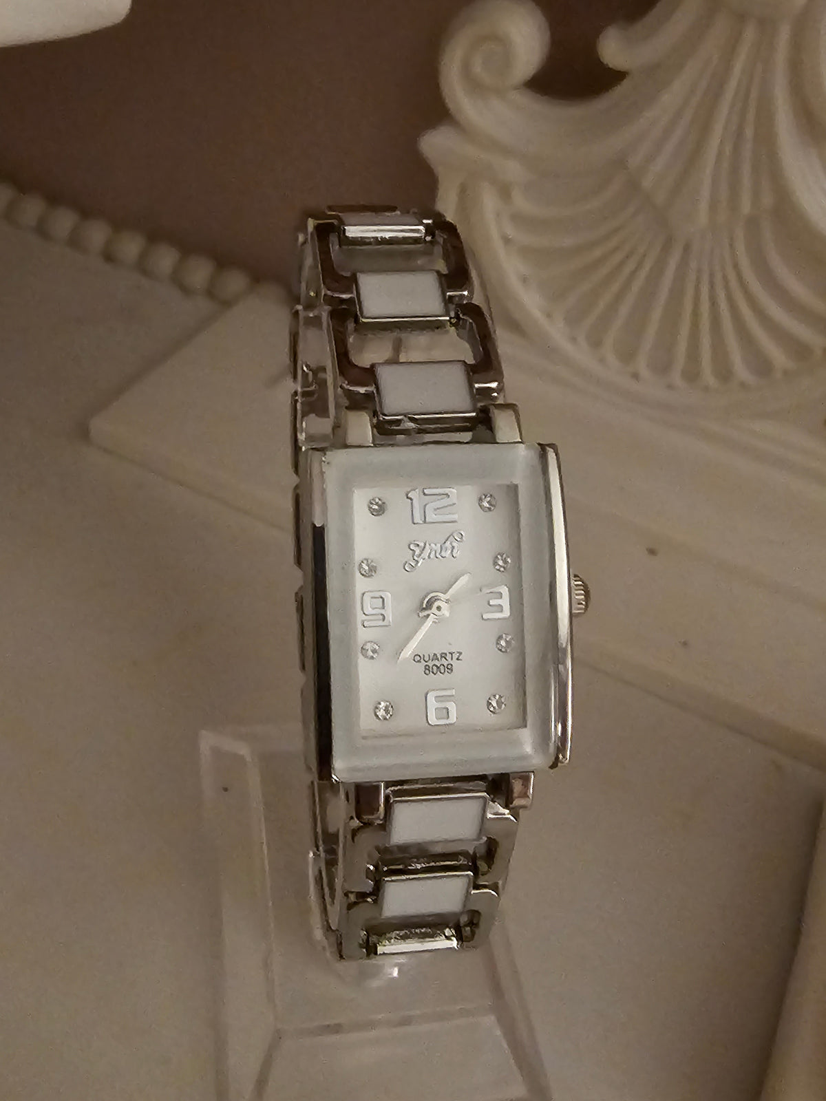 Ladies Silver Square Faced with White detailing Watch