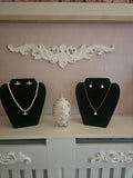 Ladies matching gold necklace with pearl drop pendant and matching pearl drop earrings