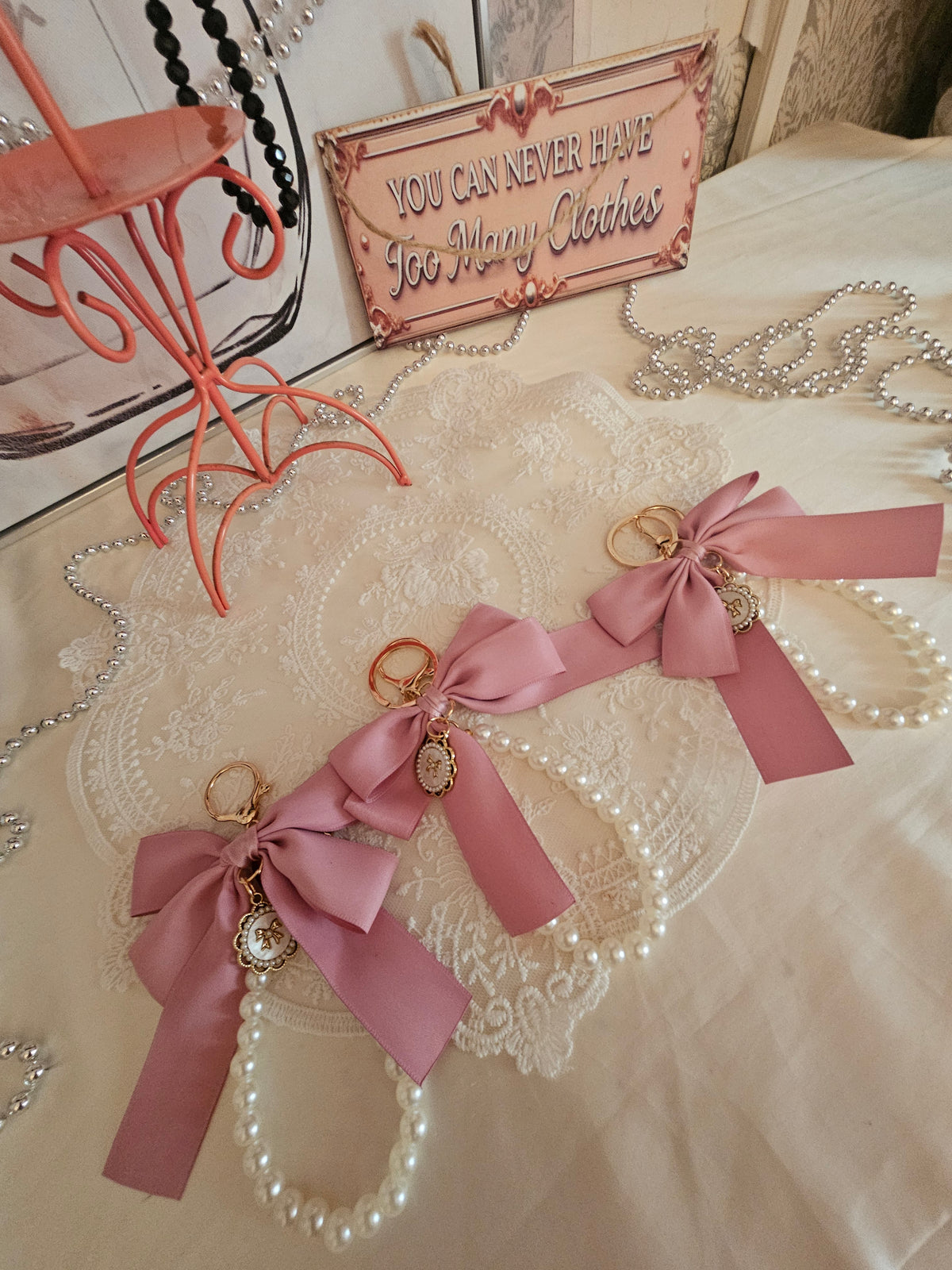 Ladies x 3 classy large pink bow with set of pearls keyrings and gold circle pendant