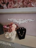 Pink and gold jewelled necklace with matching pink clover stud earrings