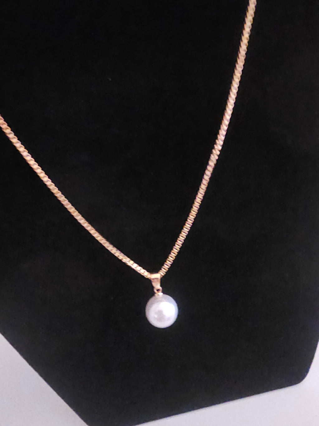 Ladies matching gold necklace with pearl drop pendant and matching pearl drop earrings