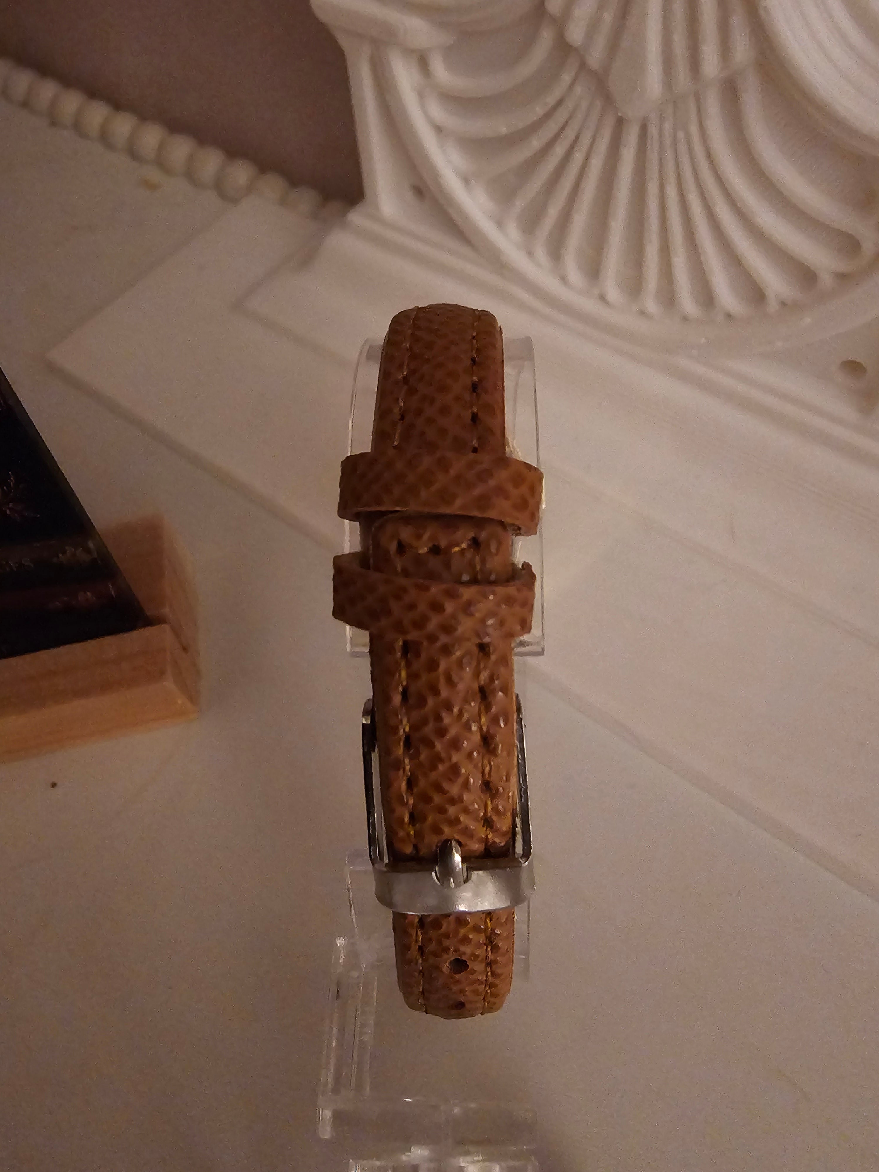 Ladies Tan Strap with Gold Oval Faced Watch