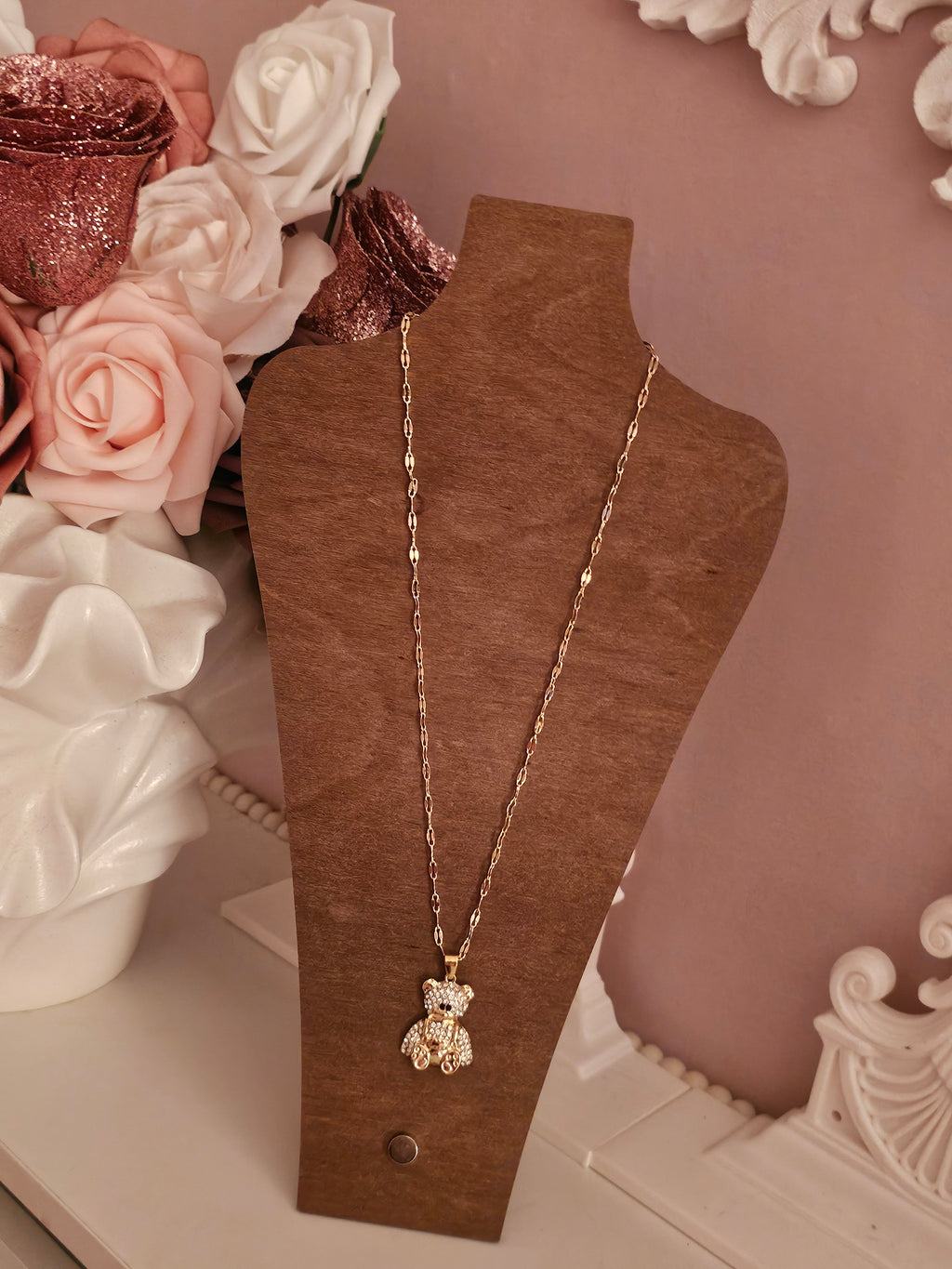 Gold necklace with diamond teddy bear pendant