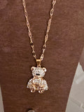 Gold necklace with diamond teddy bear pendant