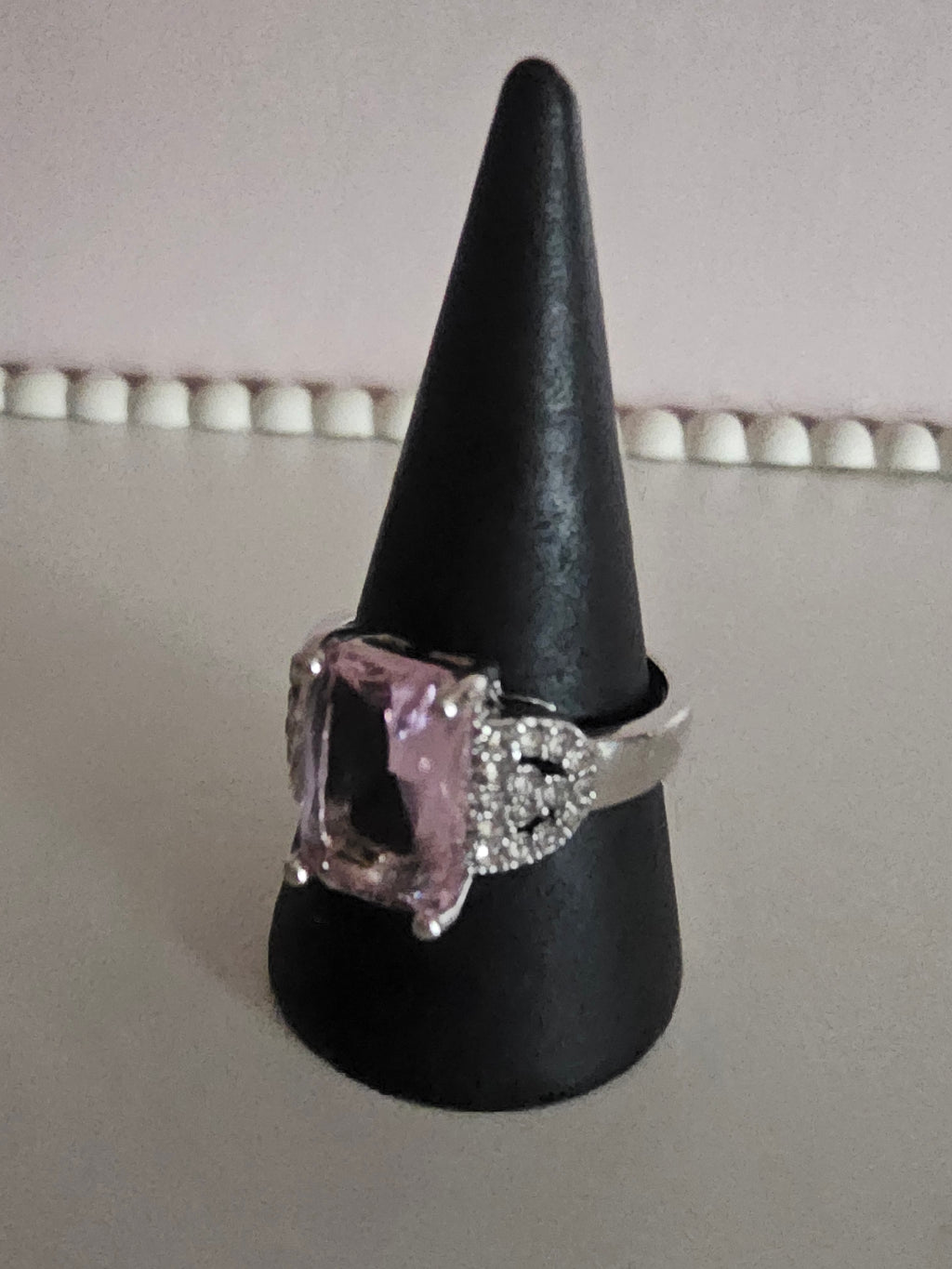 Ladies silver with silver diamonte shank and centre pink square diamond design dress ring
