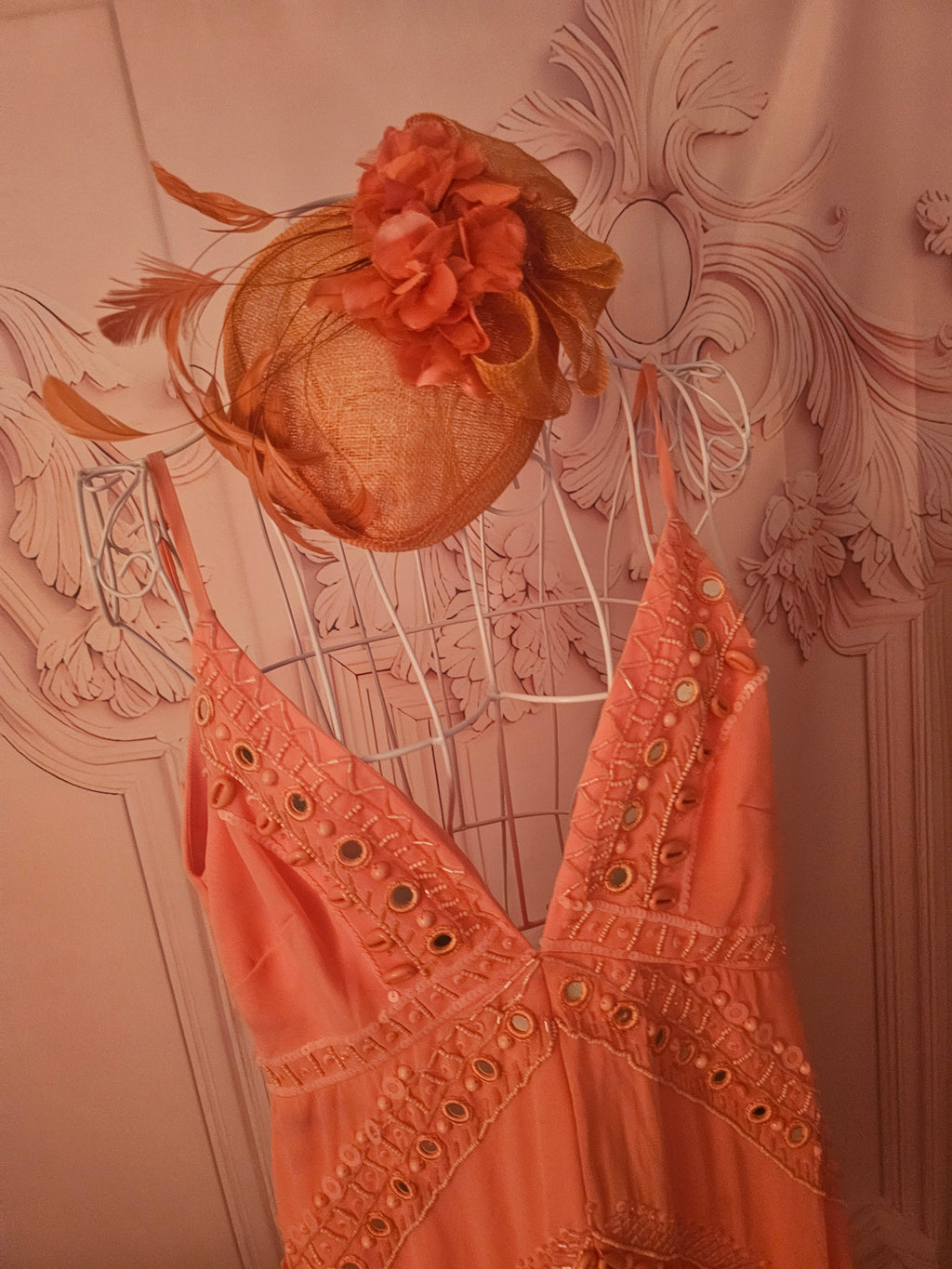 Ladies Coral with feathers Fascinator