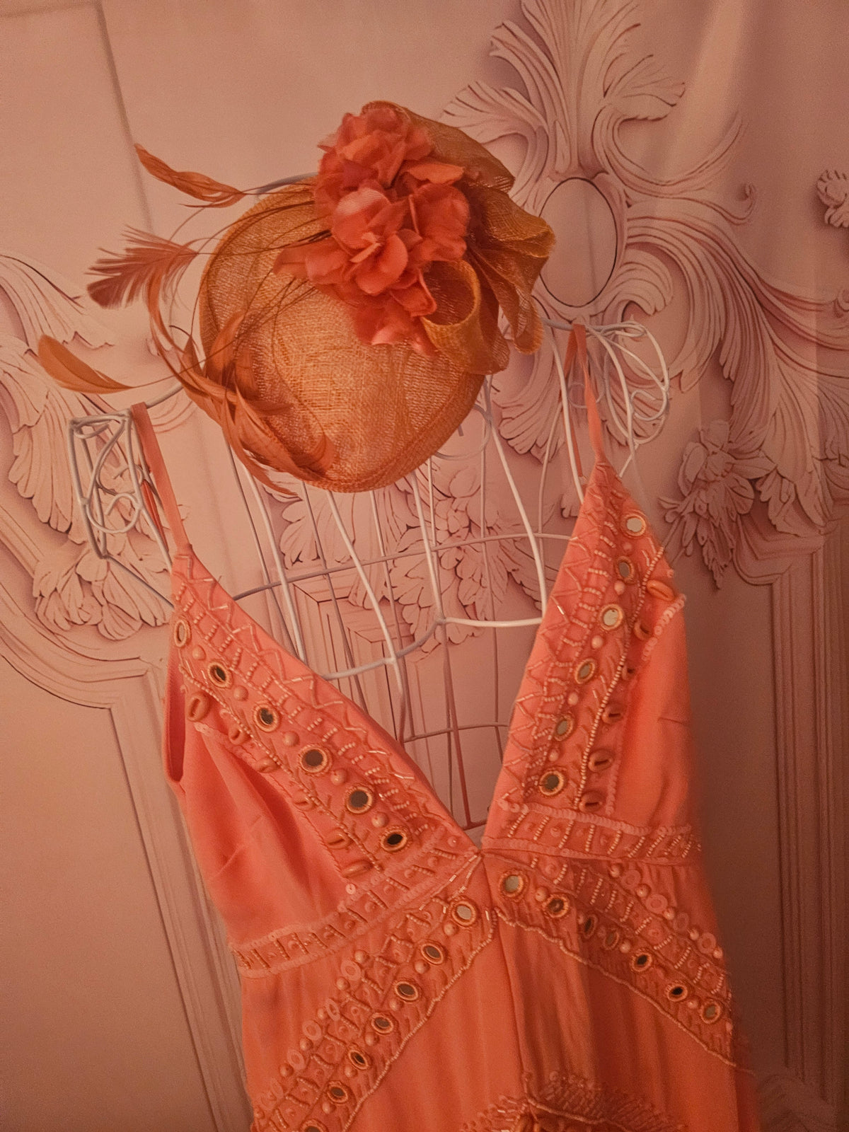 Ladies Coral with feathers Fascinator