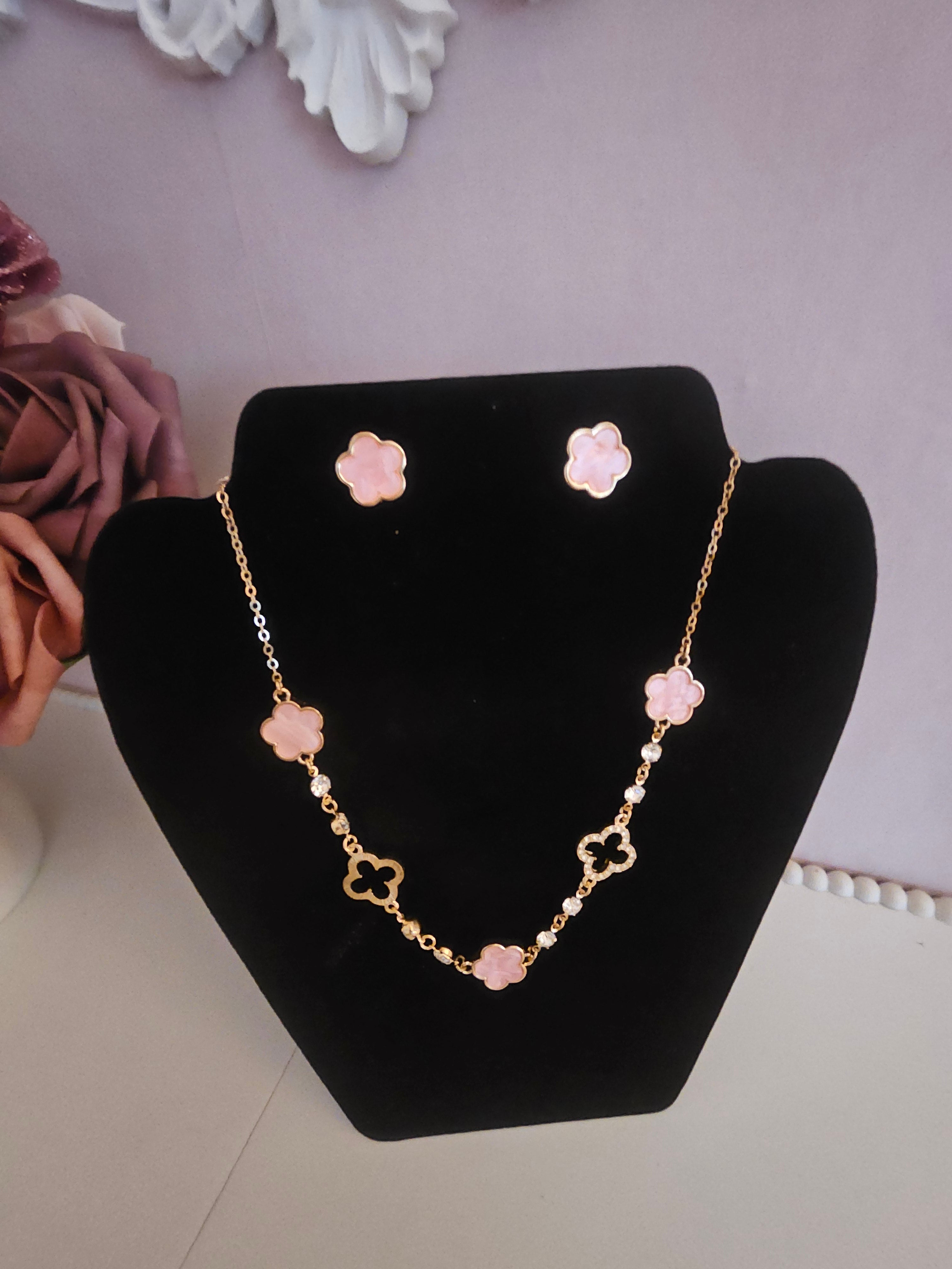 Pink and gold jewelled necklace with matching pink clover stud earrings