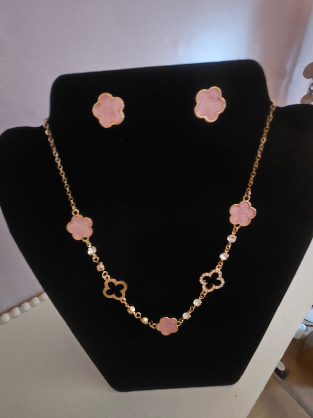 Pink and gold jewelled necklace with matching pink clover stud earrings