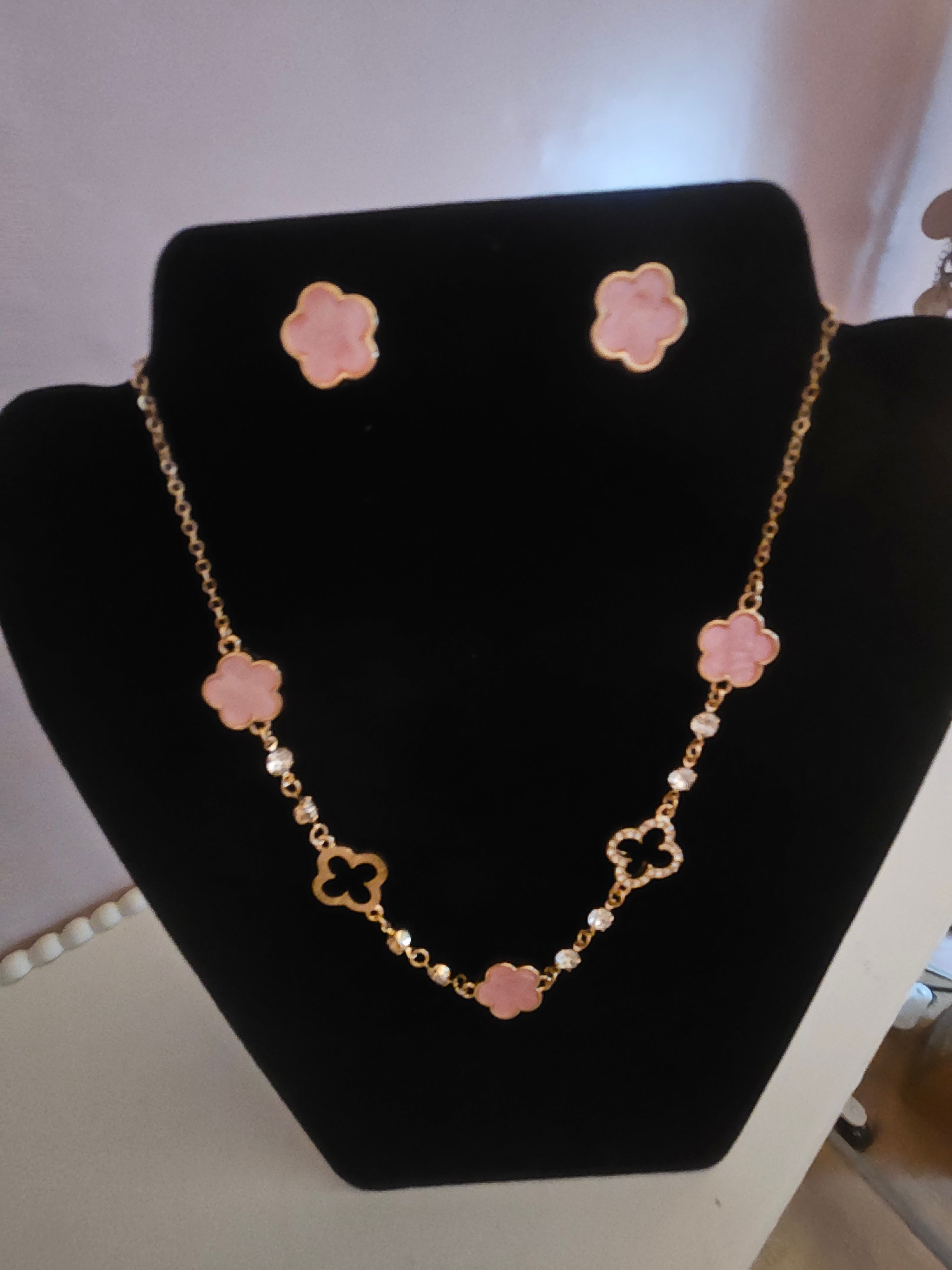 Pink and gold jewelled necklace with matching pink clover stud earrings