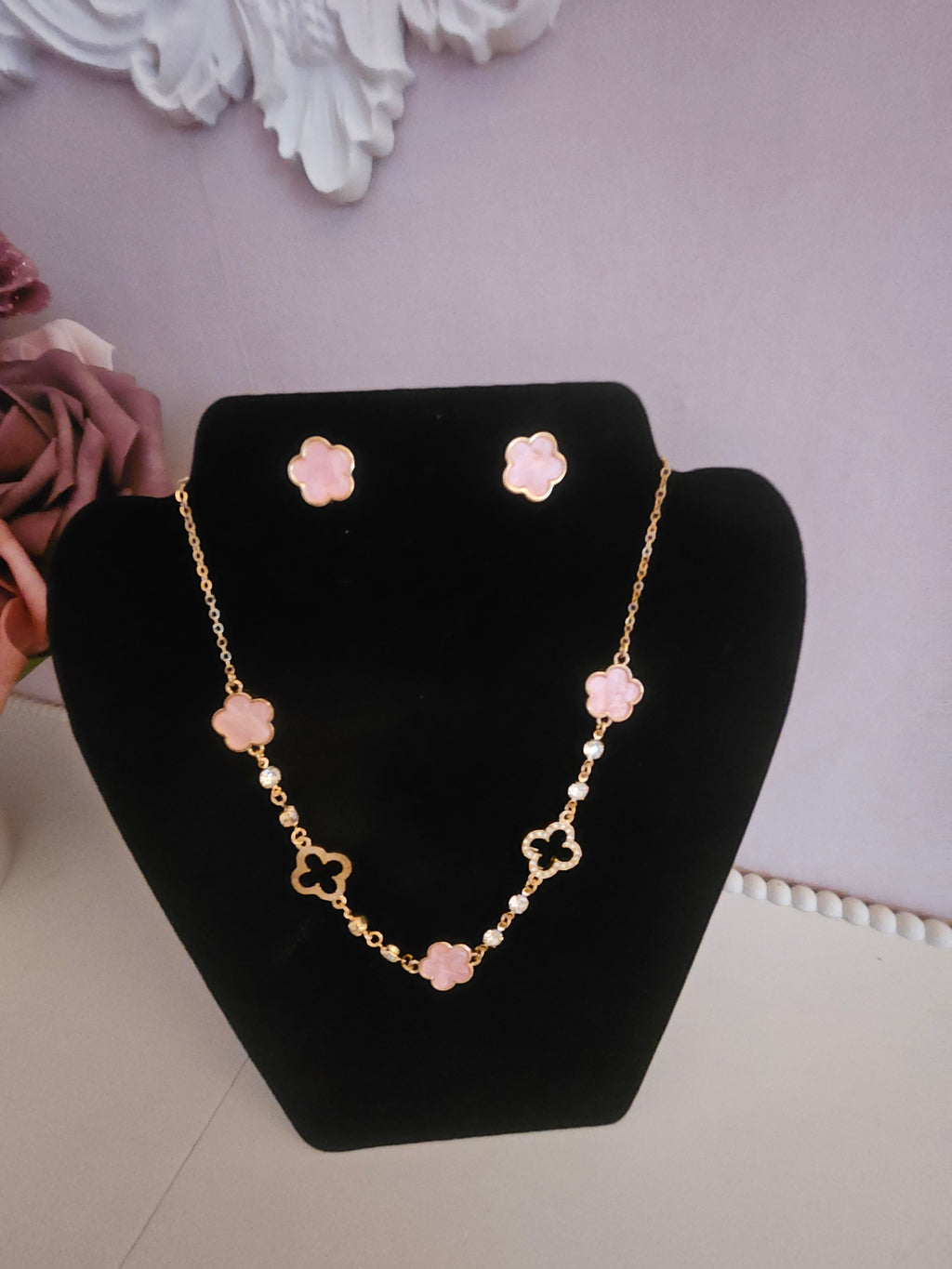 Pink and gold jewelled necklace with matching pink clover stud earrings