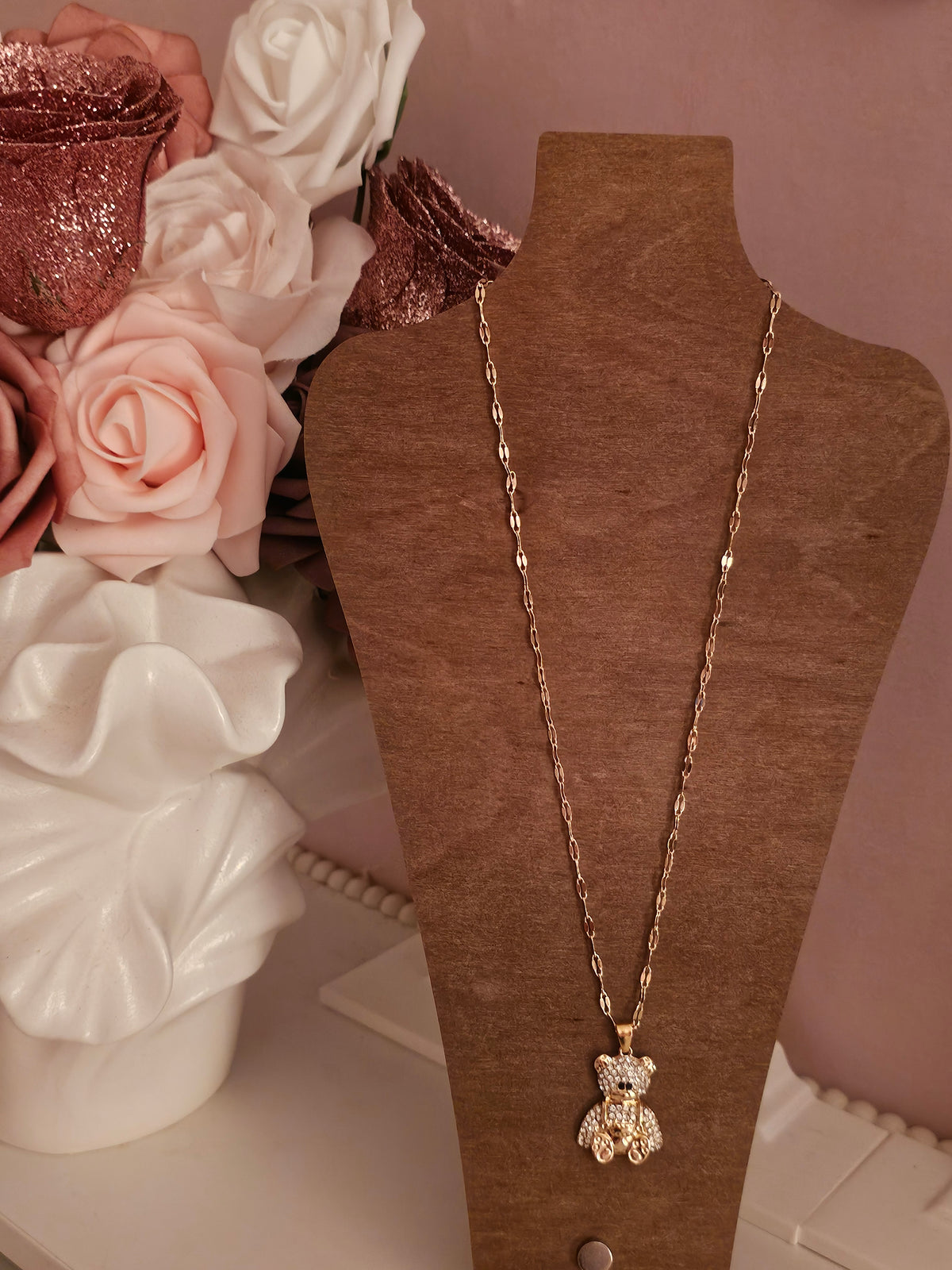 Gold necklace with diamond teddy bear pendant