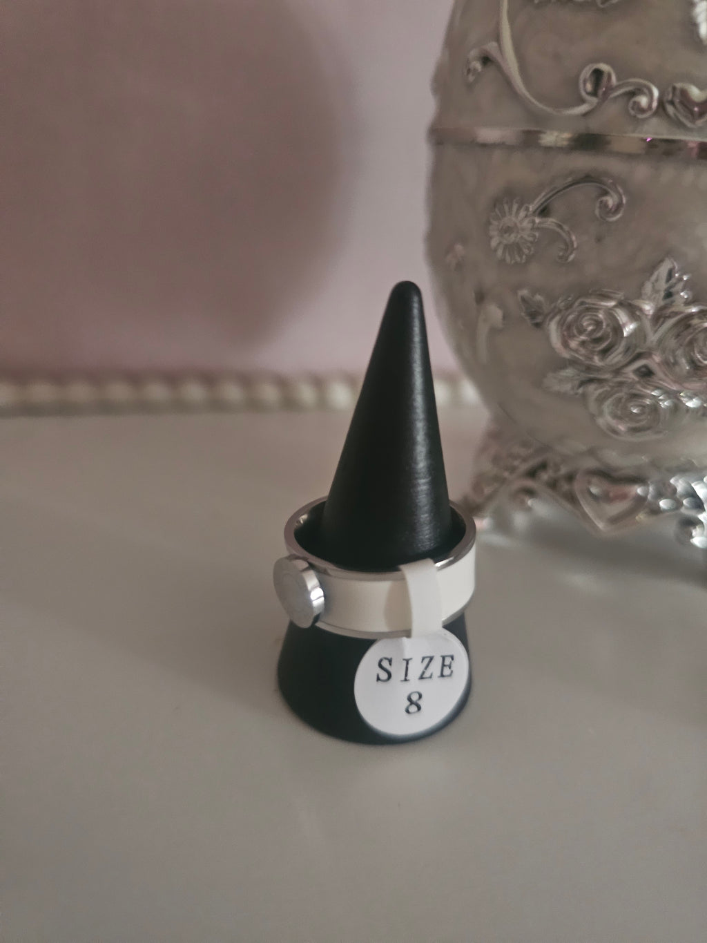 Ladies solid band rings, one white one silver size 8 £10 each