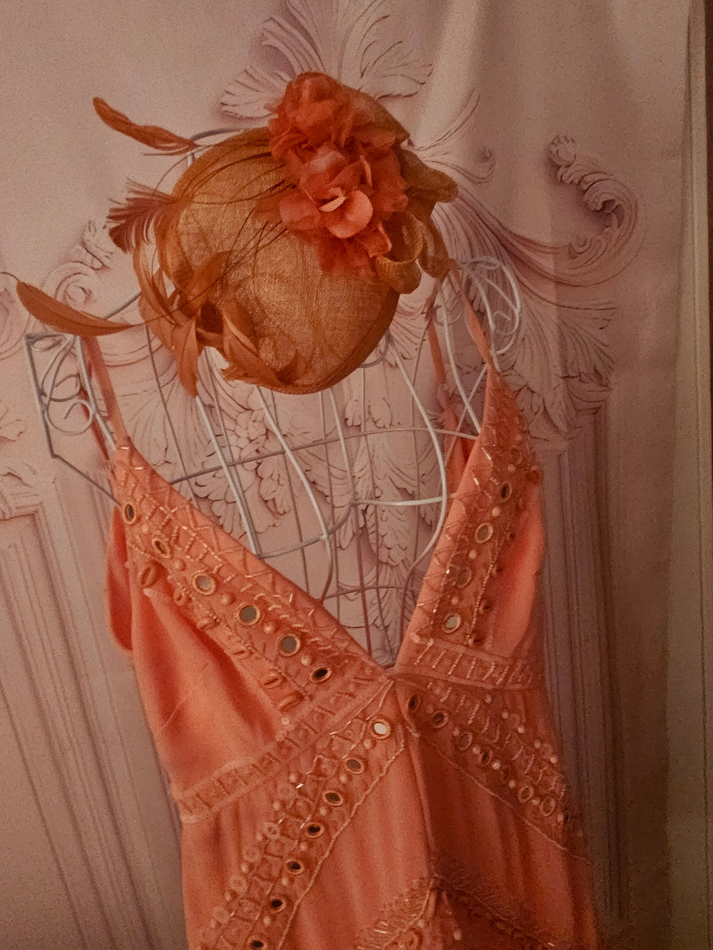 Ladies Coral with feathers Fascinator