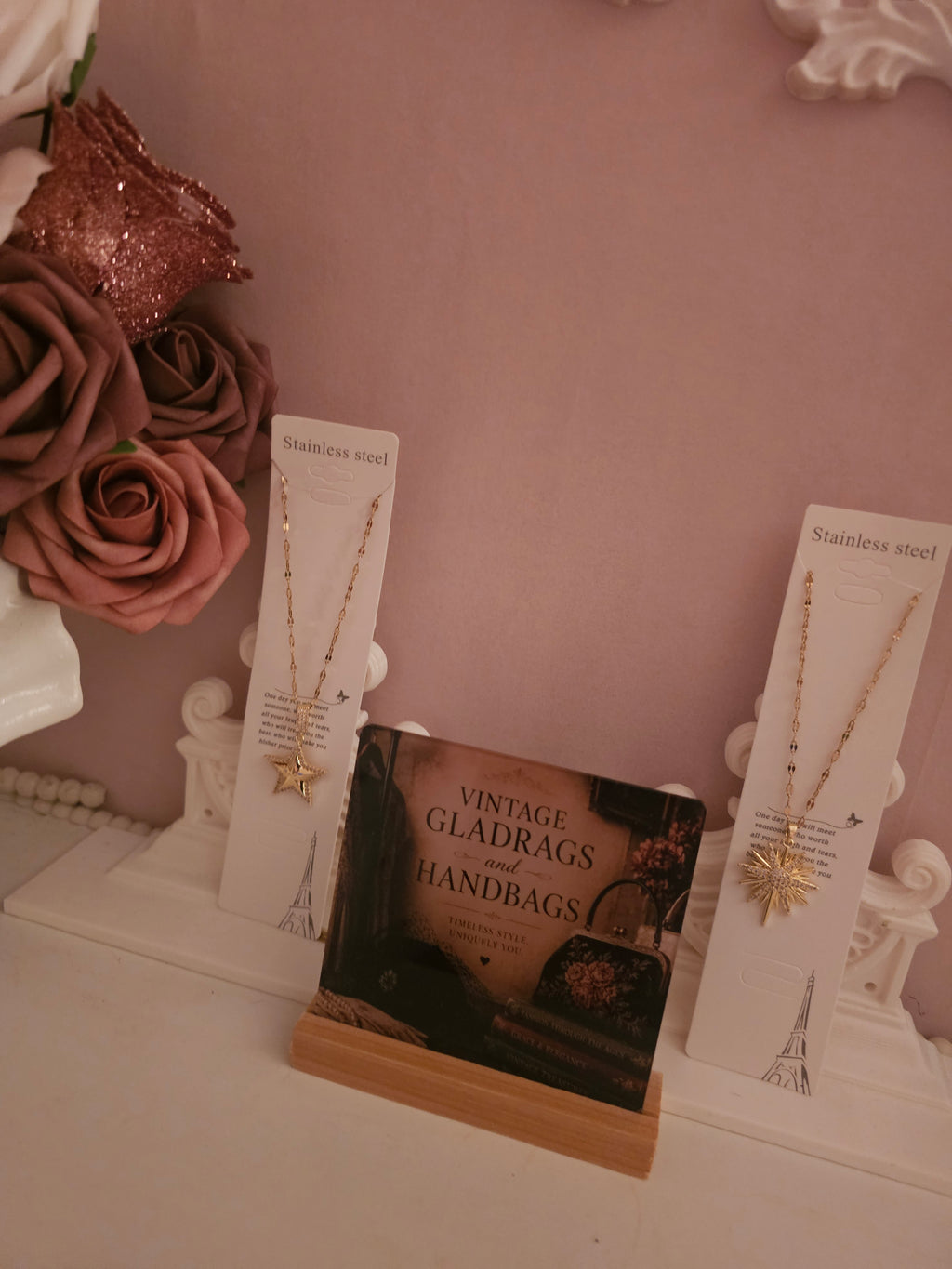 2 x gold necklace with 1 x star pendant 1 x starburst pendant