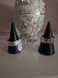 Ladies solid band rings, one white one silver size 8 £10 each