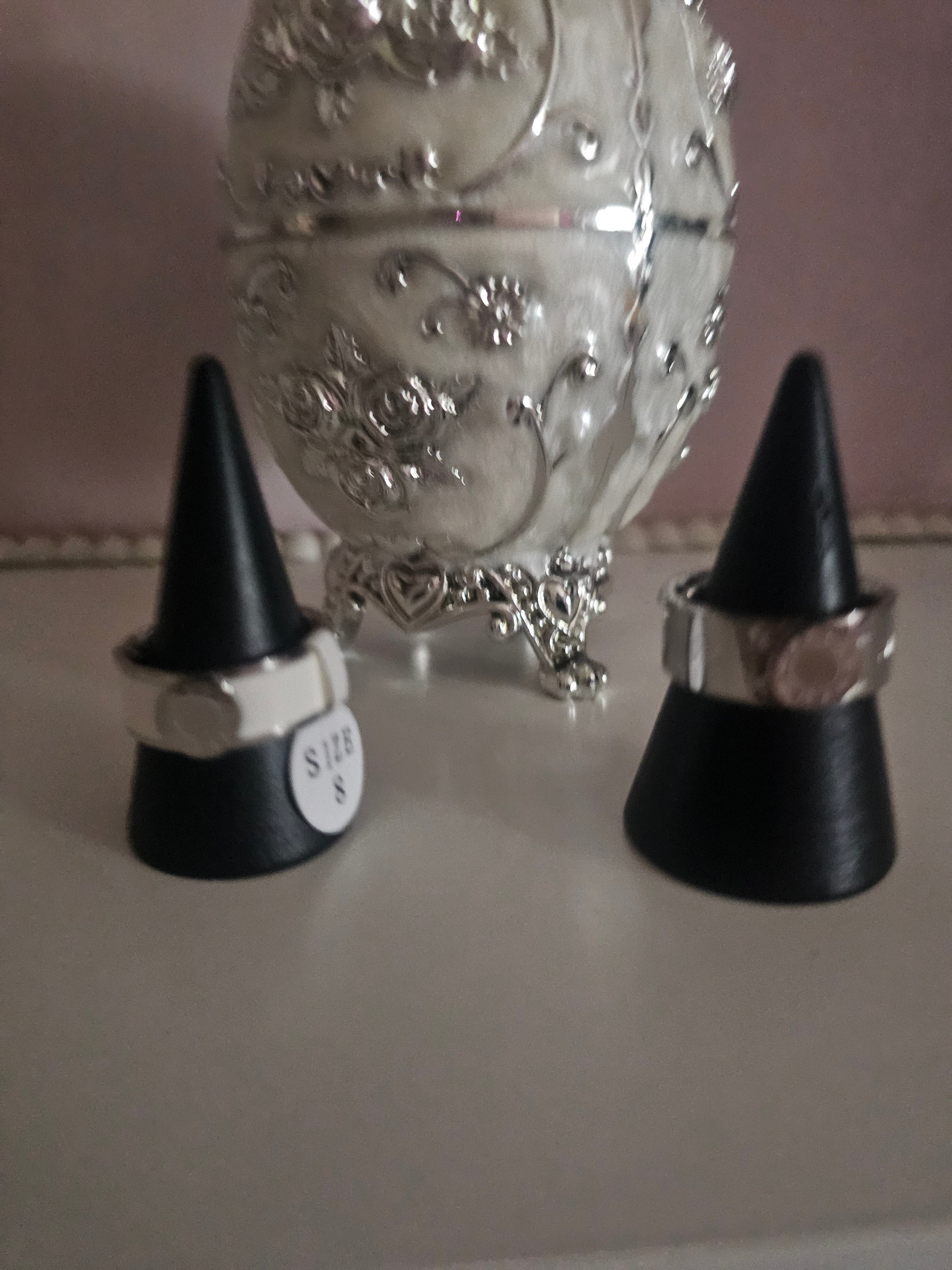 Ladies solid band rings, one white one silver size 8 £10 each