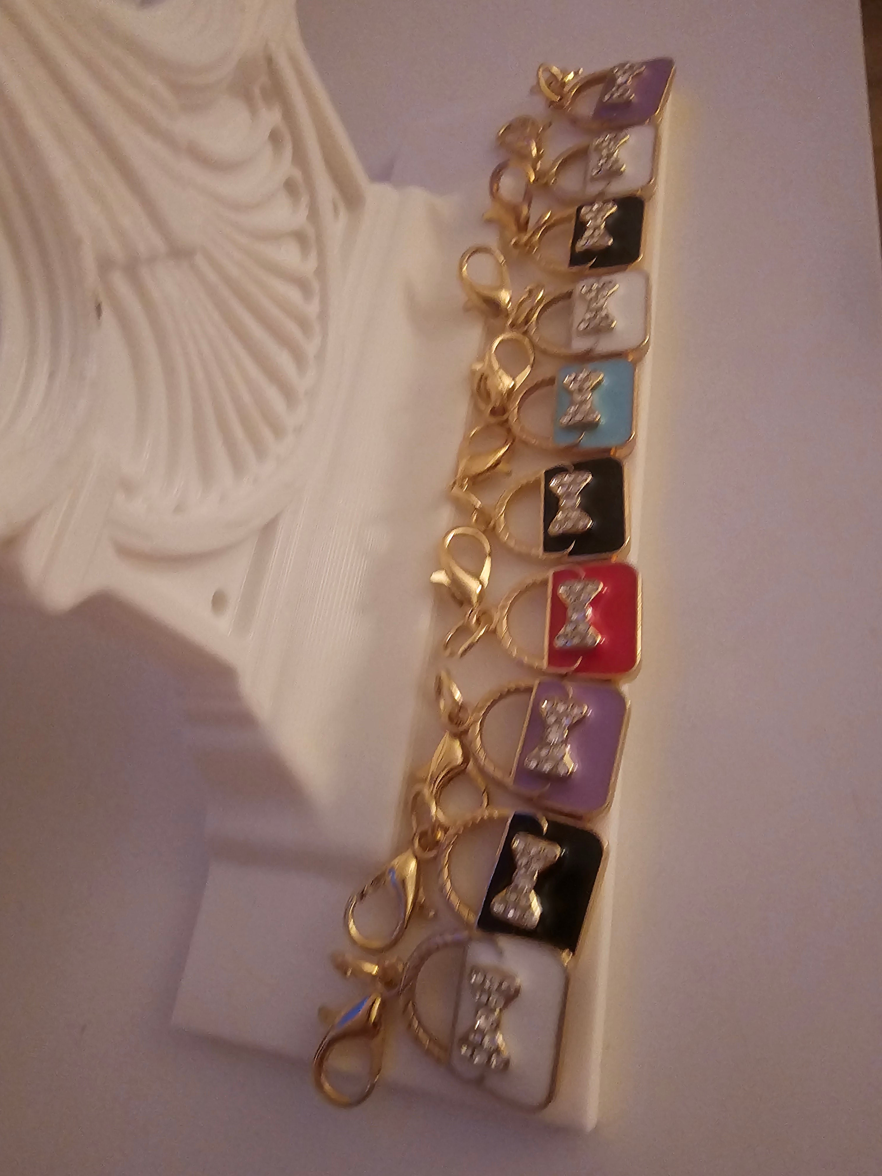 Ladies x 10 small unusal handbag keyrings