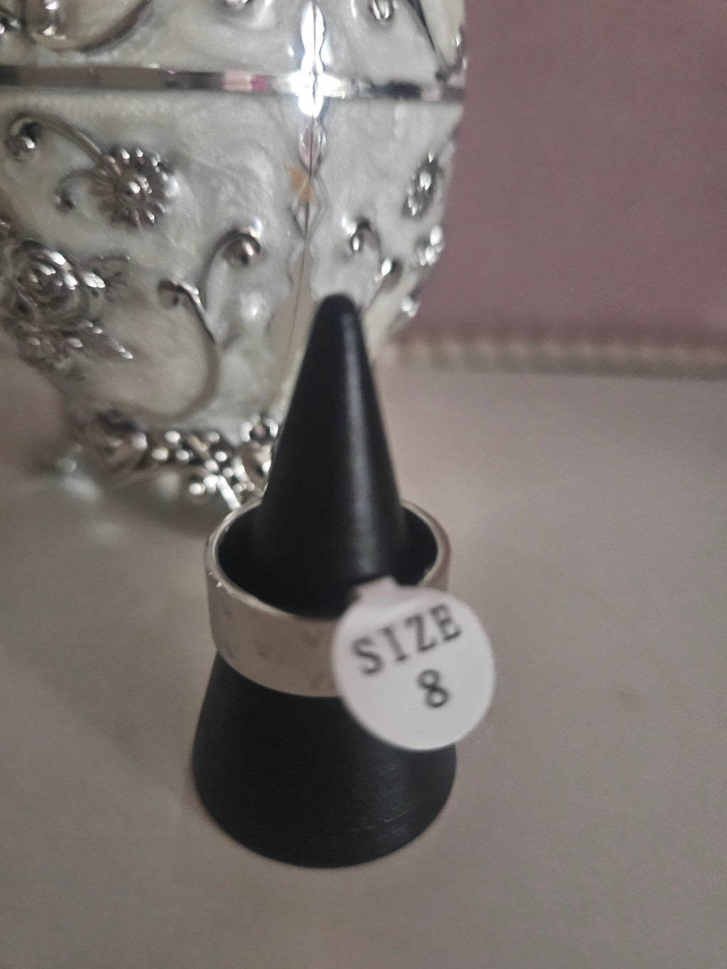 Ladies solid band rings, one white one silver size 8 £10 each